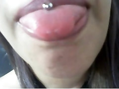 more ...sexy latina pierced tongue alarm om nails fingernails