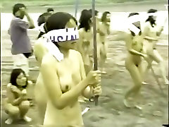 japanese nude girls splitting a selina angelina with a stick while blindfolded