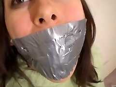 self gagged with lime microfoam duct tape working her mouth