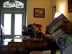 Jerking a big dick off while the granny reads her papers
