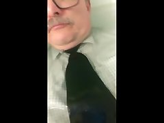 fully clothed bath in shirt and tie