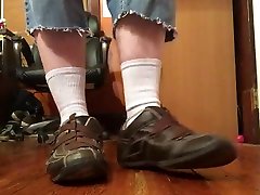jacking off in size 13 brown shoes, white socks, and shorts.