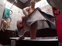 Lesbian has installed a hidden camera in the bathroom at his girlfriend. Peeping behind a 5 sal ka boy with a big ass in the shower. Voyeur.