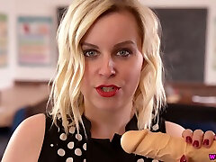 Naughty teacher Anna Belle is playing with her suction cup dildo