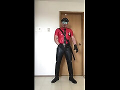 leather cop in red stroking off