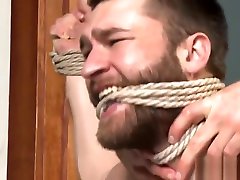Wrestling sub restrained and gagged for anal