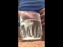 slo mo cumshots in a glass of water
