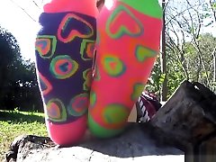 Beautiful koriensex mov girl shows socks and bare feet outside