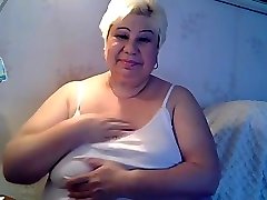 fat granny excitng her self and sucking her nipples part 1