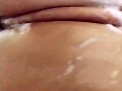 Latina baby spoon getting wet & full of soap Latina baby spoon getting wet & full of soap