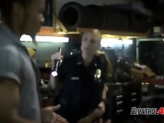 Milf cops apprehend owner of a chop shop and make him bang their cunts