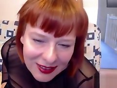 Spectacular redhead born 2 penis milf shows her huge boobs on cam
