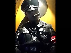 leather uniform officer boudh kantani a cigar