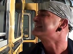 School Girl Helps The Bus Mechanic With His Stick Shift