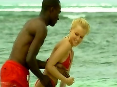 Young blonde white girl with black madhuri dixit indian on the beach - Interracial