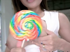 Big tit Asian swaps lollipop for hard cock