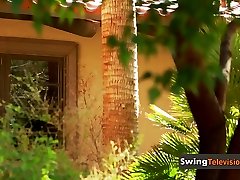Swingers enjoy a naked pool sex game where they tease a lot