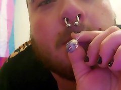 tranny boi smokes joint and plays with tits