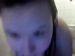 Fat teen girl fucking herself under the shower