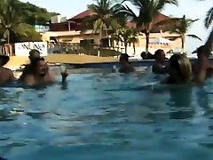 Houston and her girlfriend sucking cocks in the pool