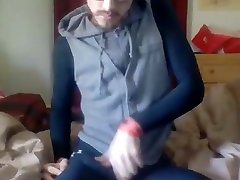 handsome bearded guy caressing his cock through tightspandex