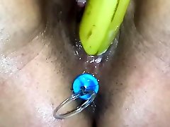 Amateur Milf Squirting fucking a Banana with Anal Beads