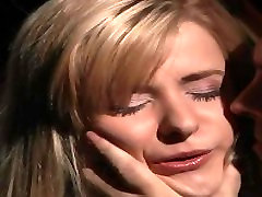 Blonde wrapped in cellophane used for kinky bdsm fantasy Blonde wrapped in cellophane used for kinky bdsm fantasy
