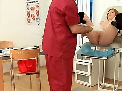 Sexy babe gets a nice cumshot on face from doctor
