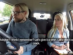 Busty driving instructor sucking student in car