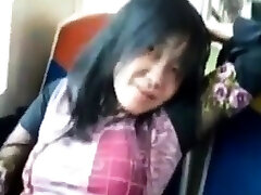 Asian abela ander rubs her clit on a train.