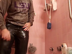shower in sweater and jeans
