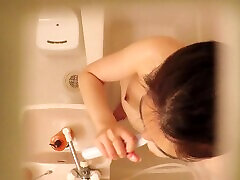 Asian beauty in shower is rubbing down her smooth skin dvd 03212