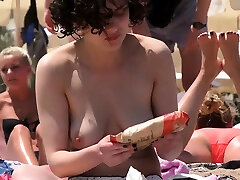 Beauty Brunette lass Topless woman sucks her own milk Voyeur Public gran corrida boobs