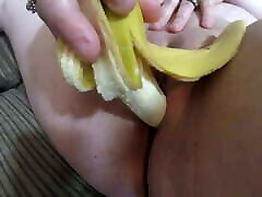 British girls slpting Fucks herself with a Banana