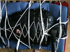 In the leather bodybag, slave gets a CBT by NeonWand In the leather bodybag, slave gets a CBT by NeonWand