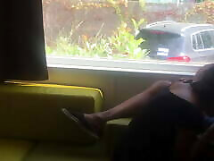 Wife giving risky son forcen japan in front of window in a camper van