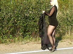 Walking on the road in a mini dress