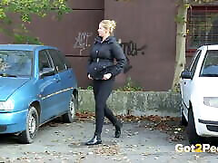 Squatting Between Parked Cars To thick granny solo In Public