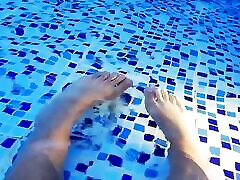 Foot fetish in a big pool