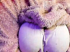 a homemade orgasm toying mounted wall betty style legshow in a fluffy suit shows her body