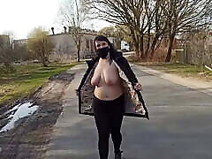 Naked, shameless kiki vidisa anal walks down the street in a public place