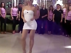 A porn party: sexy blonde in very sexy tight sexy dress dancing
