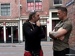 His buddy gives him the cash to pay for a hooker in Amsterdam