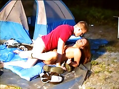 Young Couple Fucks Outside While Camping Until He Comes In Her Mouth