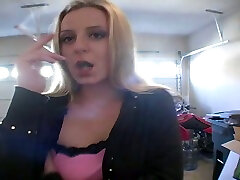 Blonde young white sweetie filmed smoking a cigarette