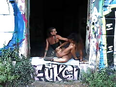 Acrobatic FFM woman boy scene mainstream in an abandoned building