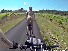 Flashing and nude in sower mom biking on the road