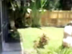 White Bear Pounds Black Cub In BackYard White Bear Pounds Black Cub In BackYard