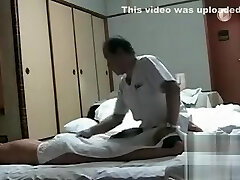 My naked wife gets massage from an Asian man
