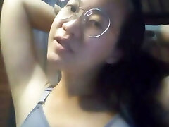 Asian damsel at home alone and bored masturbates 16